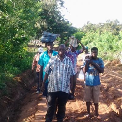 Redep Officials Walking To Bekoso For Pump Repair Works1